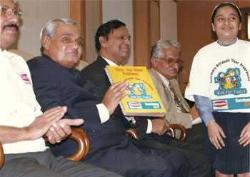 With P.M. Vajpayee receiving Save the Tiger Petitions from children